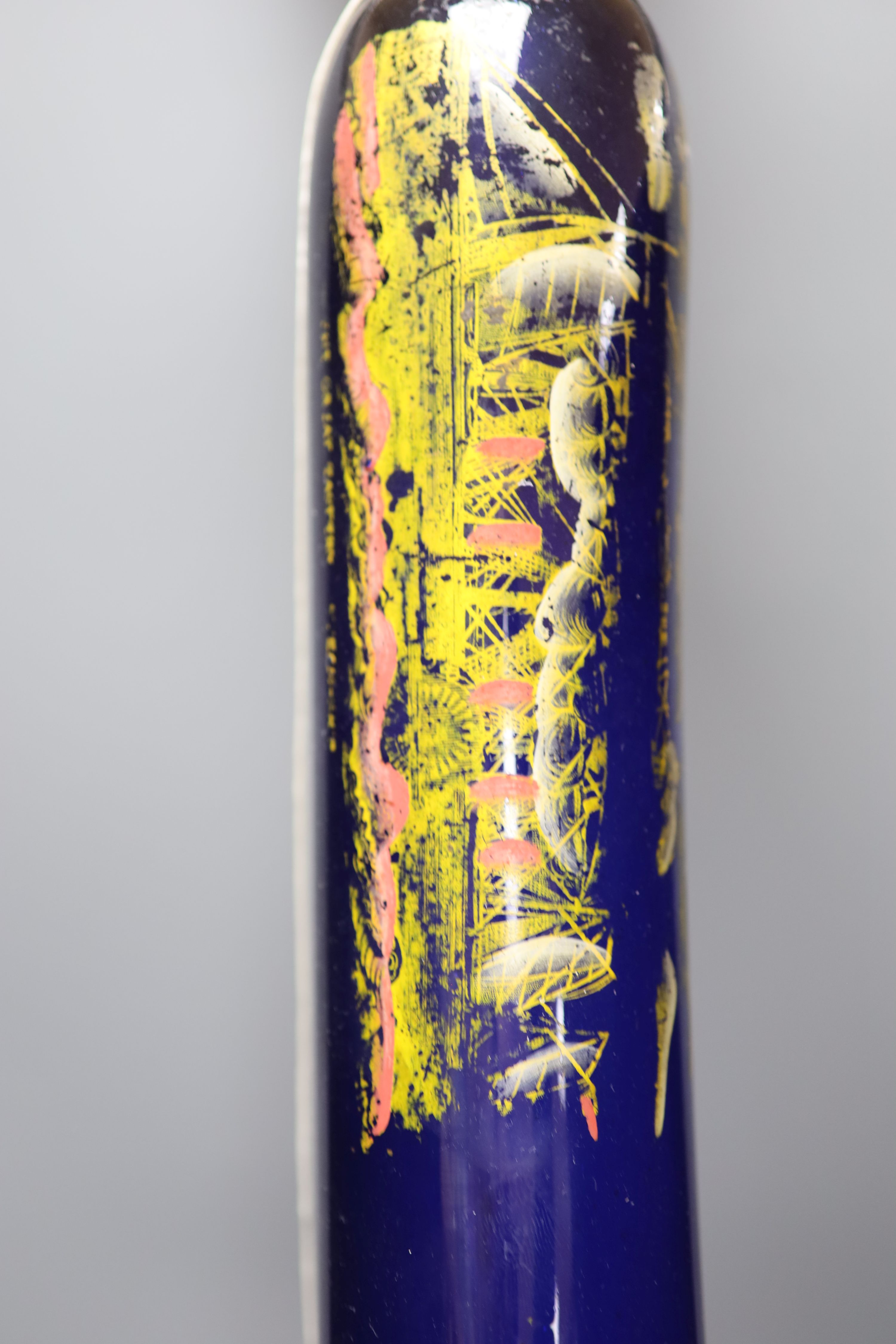 A large 9th century painted glass rolling pin, length 71cm